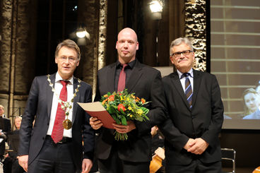 Bild vergrößern: Verleihung des Eike-von-Repgow-Stipendiums 2015 an Dr. Pierre Fütterer [Foto: Landeshauptstadt Magdeburg]